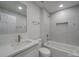 Modern bathroom with shower-tub combination and stylish white fixtures at 511 Hasty St, Marshville, NC 28103