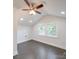 Bright bedroom features vaulted ceiling with fan, hardwood floors and double windows at 511 Hasty St, Marshville, NC 28103