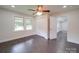 Bedroom featuring hardwood floors, a ceiling fan, and a closet at 511 Hasty St, Marshville, NC 28103