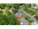 Charming brick home with deck, nestled in a lush, tree-lined neighborhood at 5301 Baker Dr, Charlotte, NC 28210