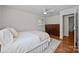 Bedroom featuring a bed, hardwood floors, and natural light at 5301 Baker Dr, Charlotte, NC 28210