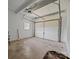 Large garage with ample space for parking or storage at 5301 Baker Dr, Charlotte, NC 28210