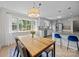 Updated kitchen and table offering natural light at 5301 Baker Dr, Charlotte, NC 28210