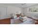 Bright living room features a neutral color scheme, modern furniture, and wood floors at 5301 Baker Dr, Charlotte, NC 28210