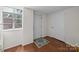 Functional mud room with natural light from a window with wood floors at 5301 Baker Dr, Charlotte, NC 28210