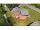 Brick home featuring a wooden deck perfect for outdoor gatherings at 5301 Baker Dr, Charlotte, NC 28210