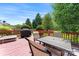 Outdoor deck with chairs, table, grill, lounge chair and fenced yard perfect for entertaining and relaxing at 5927 Patricia Ryan Dr, Charlotte, NC 28216