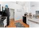Well-lit kitchen featuring black appliances and white cabinets at 5927 Patricia Ryan Dr, Charlotte, NC 28216