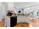 Bright kitchen with stainless steel sink and black appliances at 5927 Patricia Ryan Dr, Charlotte, NC 28216