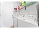 Functional laundry room with white washer and dryer at 5927 Patricia Ryan Dr, Charlotte, NC 28216