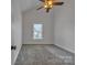 Comfortable bedroom featuring soft carpet and natural light at 63 Frost Ln, Taylorsville, NC 28681