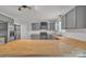 Updated kitchen featuring stainless steel appliances, grey cabinets, and butcher block countertops at 63 Frost Ln, Taylorsville, NC 28681