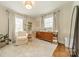 Bedroom has soft carpet, large windows, and natural light at 6339 Montpelier Rd, Charlotte, NC 28210