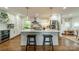 Well-appointed kitchen featuring an island with seating, modern appliances, and ample cabinet space at 6339 Montpelier Rd, Charlotte, NC 28210