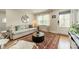 Cozy living room featuring natural light, a comfortable couch, and stylish decor accents at 6339 Montpelier Rd, Charlotte, NC 28210