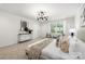 Comfortable main bedroom with natural light and seating area at 6524 Robert St, Huntersville, NC 28078