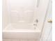 This clean, white bathtub has a shower faucet and a handheld shower head at 7206 Forrest Rader Dr, Mint Hill, NC 28227