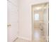 Entry to a bright laundry room featuring a window, washer and dryer at 7206 Forrest Rader Dr, Mint Hill, NC 28227
