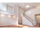 Spacious living room boasts an open floor plan, high ceilings, and a staircase at 7206 Forrest Rader Dr, Mint Hill, NC 28227