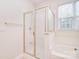 Shower with a seamless glass door in the main bathroom at 7206 Forrest Rader Dr, Mint Hill, NC 28227