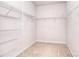 Empty walk-in closet with multiple metal shelves at 7206 Forrest Rader Dr, Mint Hill, NC 28227