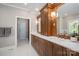 Bathroom featuring a double sink vanity with marble countertop and wooden cabinets at 7701 Gold Hill Rd, Rockwell, NC 28138