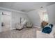 Cozy living room with comfortable seating and natural light at 7701 Gold Hill Rd, Rockwell, NC 28138