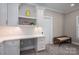 Office featuring custom built-in desk with shelves and drawers at 7701 Gold Hill Rd, Rockwell, NC 28138