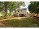 Spacious backyard featuring a privacy fence, gazebo, and a well-maintained lawn at 8607 Cedardale Ridge Ct, Charlotte, NC 28269