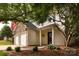 Charming two-story home featuring a stone facade, attached two-car garage, and inviting front porch at 8607 Cedardale Ridge Ct, Charlotte, NC 28269