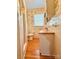 A small bathroom with a shower and vanity sink at 8664 Nc 742 S Hwy, Wadesboro, NC 28170