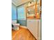Charming bathroom with wood floors, vanity and neutral paint at 8664 Nc 742 S Hwy, Wadesboro, NC 28170