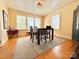 Dining room with hardwood floors, natural light, and classic design elements at 8664 Nc 742 S Hwy, Wadesboro, NC 28170