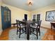 Spacious dining room with traditional decor, hardwood floors, and ample seating at 8664 Nc 742 S Hwy, Wadesboro, NC 28170