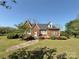 Charming brick home with a well-manicured lawn and colorful landscaping at 8664 Nc 742 S Hwy, Wadesboro, NC 28170