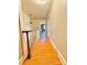 Hallway with beautiful hardwood flooring and a decorative pendant light fixture at 8664 Nc 742 S Hwy, Wadesboro, NC 28170