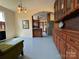 A vintage style kitchen with an eat-in area, unique cabinets, and stainless steel appliances at 8664 Nc 742 S Hwy, Wadesboro, NC 28170