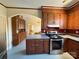 Open kitchen area featuring modern appliances and an adjoining informal seating area at 8664 Nc 742 S Hwy, Wadesboro, NC 28170
