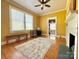 A cozy living room with hardwood floors, fireplace, and built-in shelves at 8664 Nc 742 S Hwy, Wadesboro, NC 28170