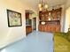 Inviting sitting area with vintage china cabinet and view to the kitchen at 8664 Nc 742 S Hwy, Wadesboro, NC 28170