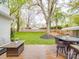 A backyard deck offers outdoor living space with beautiful backyard views and lots of space for fun at 901 Burnley Rd, Charlotte, NC 28210