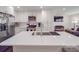 Modern kitchen featuring a large island, stainless steel appliances and white cabinetry at 901 Burnley Rd, Charlotte, NC 28210