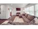 Comfortable living room includes hardwood flooring and modern entertainment center at 901 Burnley Rd, Charlotte, NC 28210