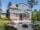 A stunning backyard with pool, outdoor kitchen, fire pit, and patio seating for entertaining guests at 101 Cross Current Ln # 137, Belmont, NC 28012