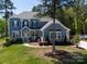 Beautiful two-story house with lush lawn and mature landscaping in a desirable neighborhood at 101 Cross Current Ln # 137, Belmont, NC 28012