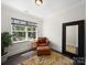 Office with a large window, hardwood floors, leather chair, and unique area rug at 101 Cross Current Ln # 137, Belmont, NC 28012