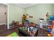 Charming playroom with hardwood floors, plenty of toys and activities to keep children entertained for hours at 101 Cross Current Ln # 137, Belmont, NC 28012