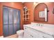 Well-lit bathroom with marble countertop, modern sink, and custom shelves at 1021 Vickie Ln, Matthews, NC 28104