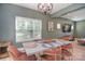 Elegant dining area featuring stylish lighting, comfortable seating, and modern decor elements at 1021 Vickie Ln, Matthews, NC 28104
