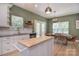 Bright kitchen with a center island and a dining room set at 1021 Vickie Ln, Matthews, NC 28104